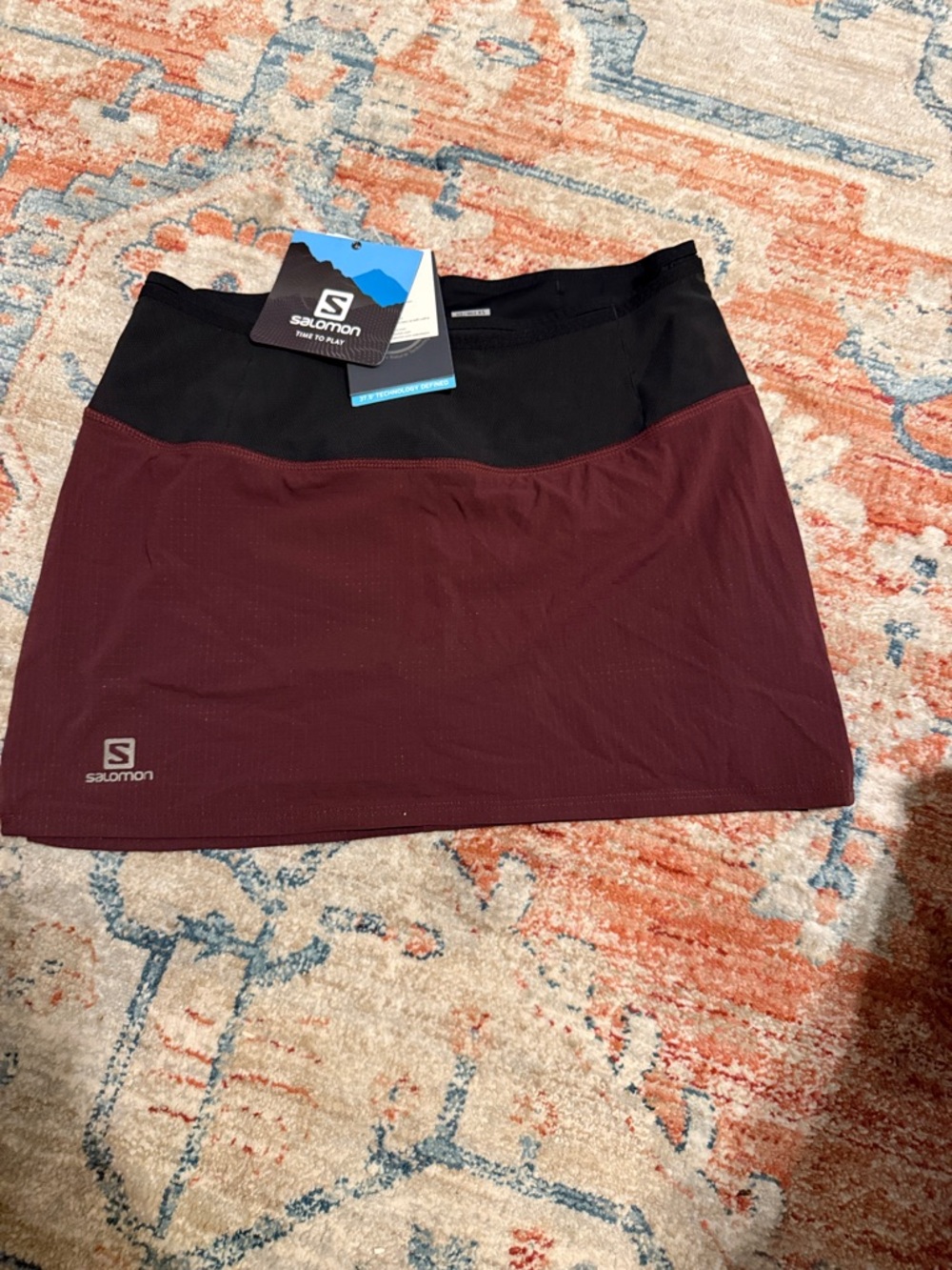 Salomon Women's Black and Burgundy Athletic Skort